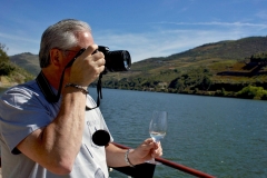 Life is good! Relaxing on the Douro and taking it all in with a great view and unique perspective from the water, looking up at the monumental quintas and vineyards of the greater Douro Valley.NSR = No selfie required.