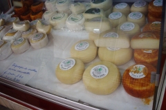 A variety of queijo available atmarket in Porto.